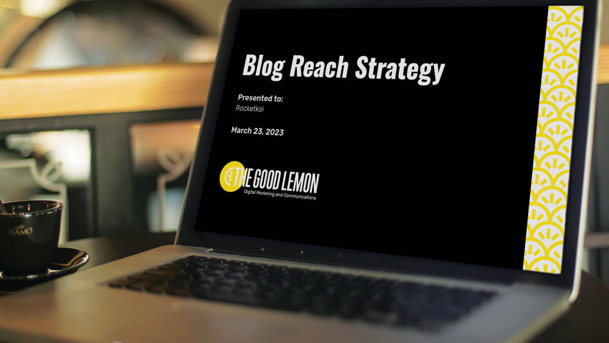 Laptop with a slide on the screen that says Blog Reach Strategy